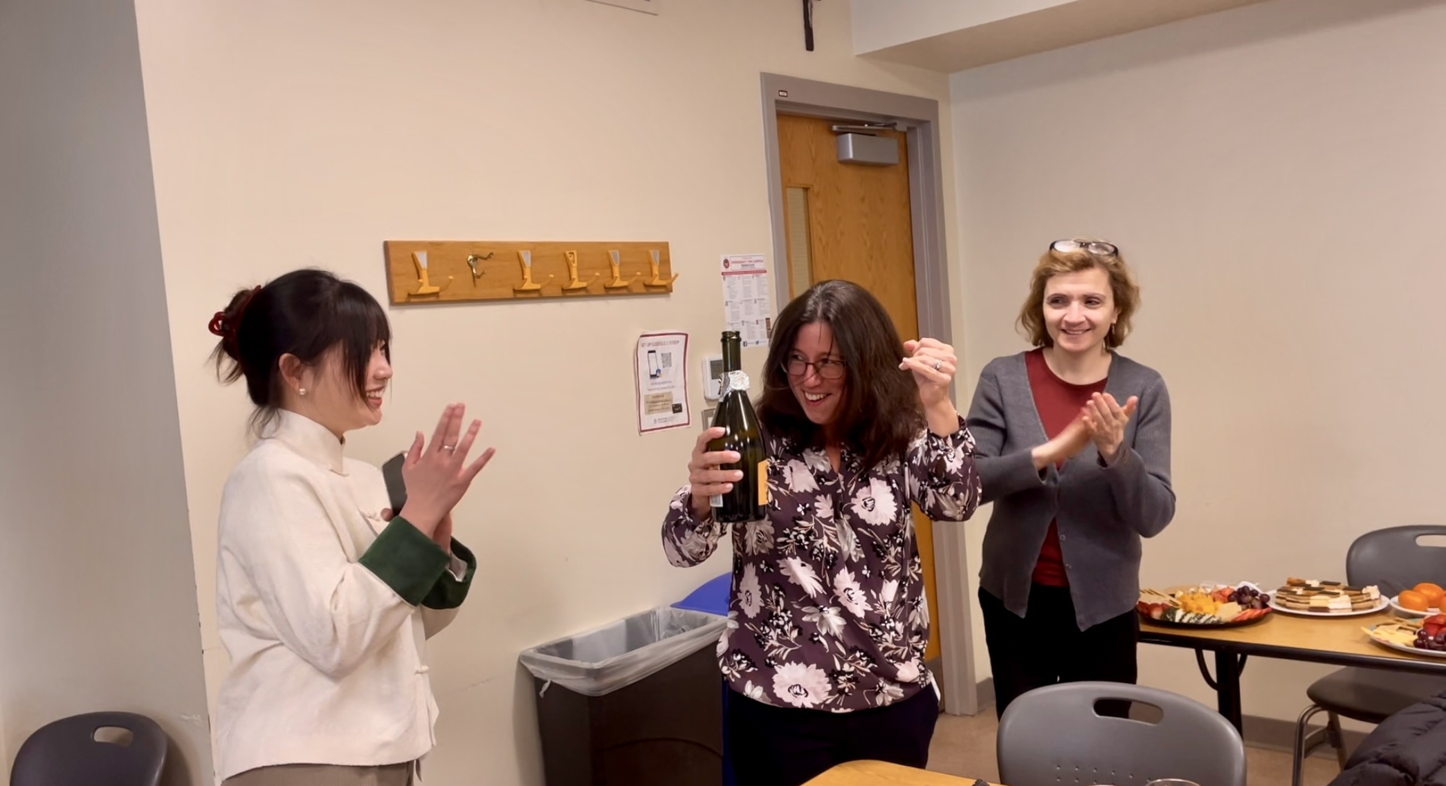 Linxi, Elida, and Marina celebrating Linxi's dissertation defense! (2024)